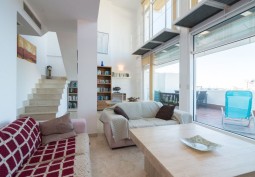 Livingroom at Triplex penthouse with views of mediterranean