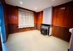 Livingroom, Fireplace at Small Townhouse With Mismatch Interior For Filming