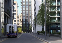 Private road passing through modern high rise apartment buildings