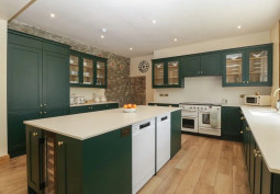 Kitchen (With Island), Kitchen (Coloured units), Kitchen (Modern), Kitchen (Electric/Induction Hob) at Large Nine Bedroom Farmhouse For Filming, Wales