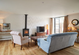 Livingroom, Fireplace at Recently Renovated One Bedroom Bungalow For Filming, Norfolk