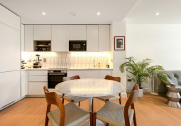 Kitchen (Modern), Kitchen With Table, Open-plan, Kitchen (White units), Kitchen (Electric/Induction Hob) at Bright One Bedroom Apartment On The 15th Floor For Filming, London