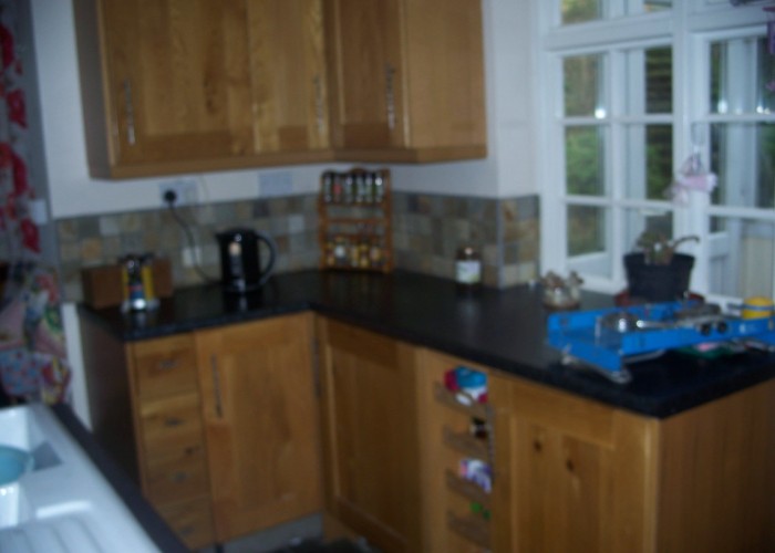 9. Kitchen (Wooden Units)