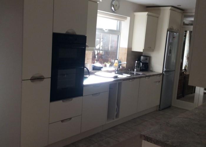 3. Kitchen (Cream or White units)