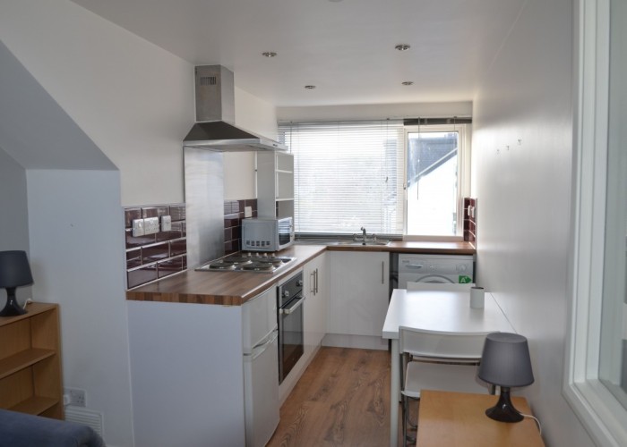 4. Kitchen (Cream or White units)