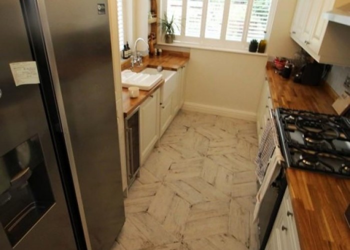 5. Kitchen (Cream or White units)