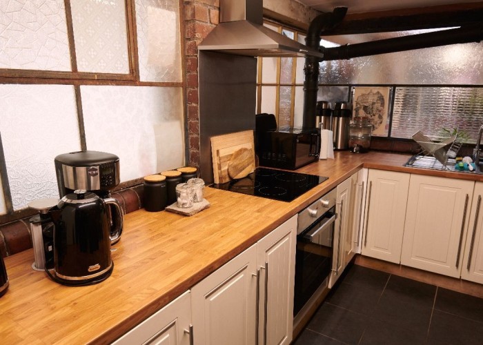 8. Kitchen (Cream or White units), Kitchen (Electric/Induction Hob)