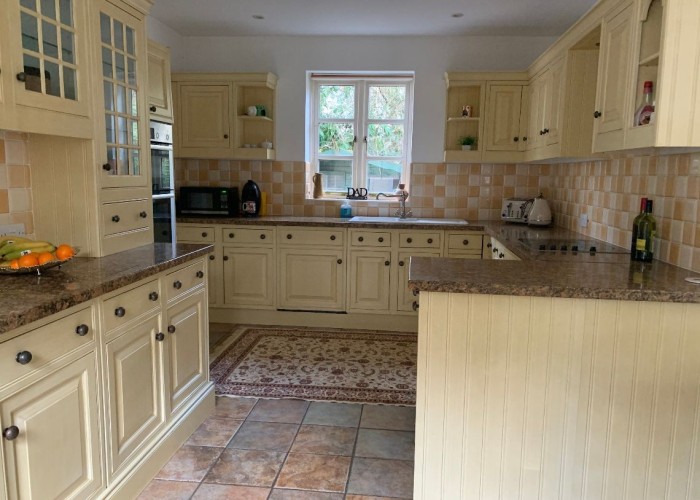 2. Kitchen (Cream or White units)