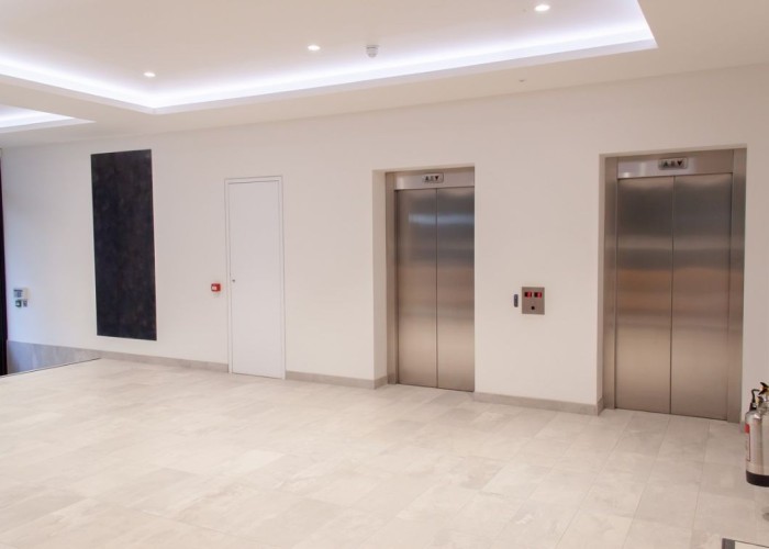 15. Contemporary 4 storey London office foyer and lifts available for filming and corporate events.