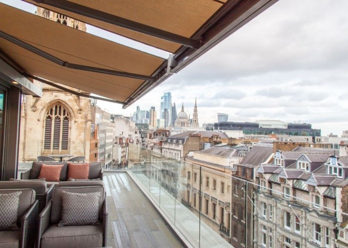 1. Covered London office balcony with city views. The balcony is hireable for filming or events