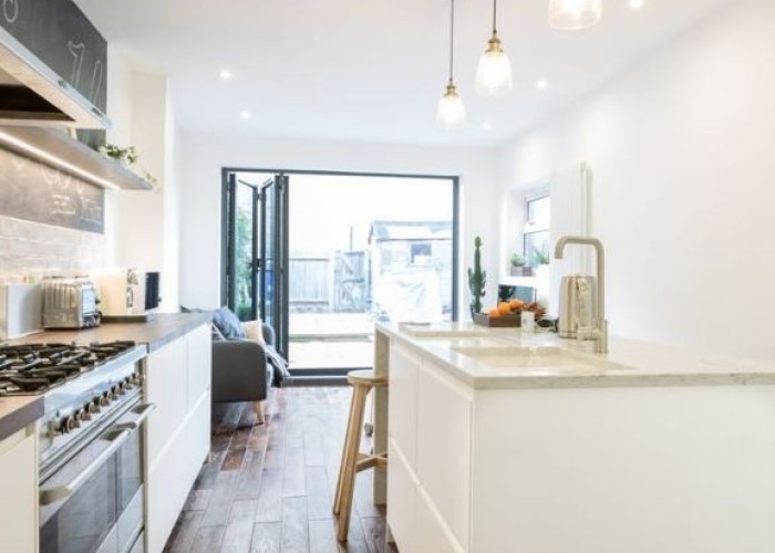 2. Kitchen (With Island), Kitchen (White units), Bi-Fold Doors, Kitchen (Gas Hob)