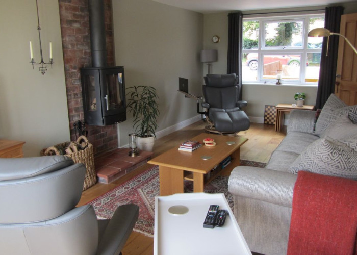 11. Livingroom, Brick Wall, Wood Burner