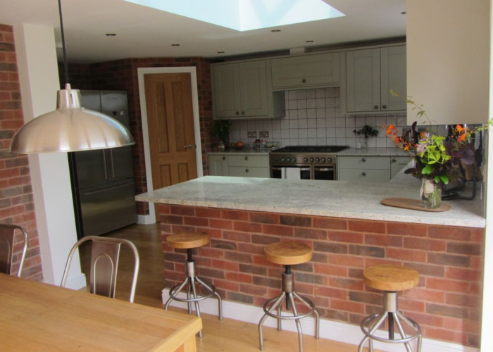 16. Kitchen, Brick Wall, Kitchen With Table, Skylight