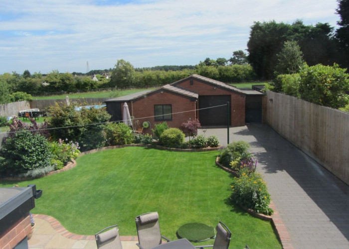 47. Gardens, Driveway, Garage, Patio / Veranda, Lawn