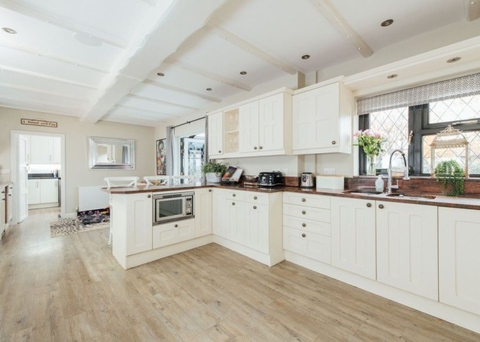 9. Kitchen (Cream or White units), Kitchen With Table, Kitchen (White units), Kitchen (Electric/Induction Hob)