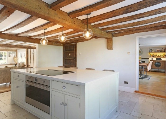 6. Kitchen (With Island), Kitchen (Cream or White units), Kitchen (Modern), Kitchen (Electric/Induction Hob)