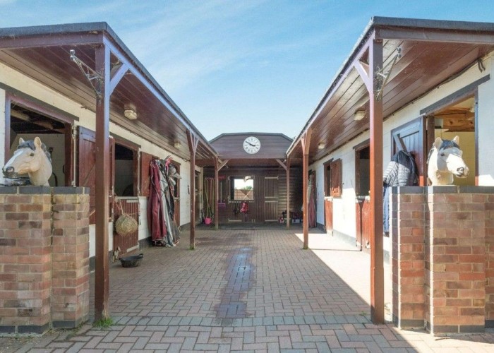 25. Stables