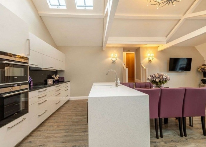 42. Kitchen (With Island), Kitchen (Cream or White units), Kitchen (Electric/Induction Hob)