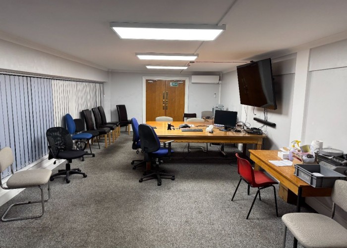 9. Meeting room with large TV screen - film location