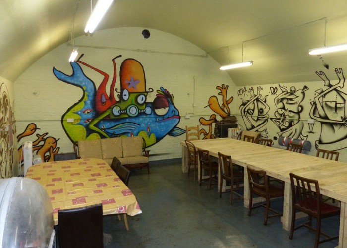Graffiti at renovated = London: Derelict Fort With Bunkers For Filming, Kent
