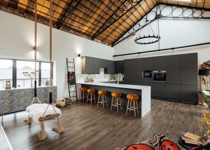 4. Modern kitchen in large room. Room has spectacular high ceiling