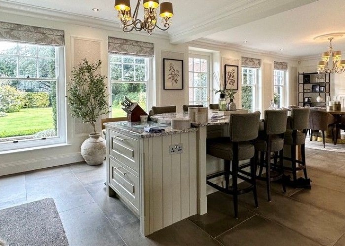 6. Windows, Kitchen (With Island), Kitchen (Cream or White units), Kitchen With Table