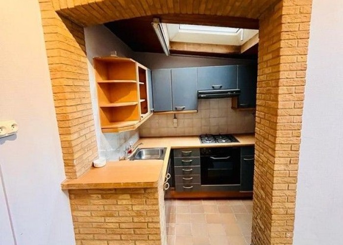 9. Brick Wall, Kitchen (Coloured units), Skylight