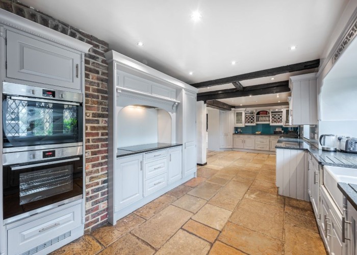 3. Kitchen (Cream or White units)