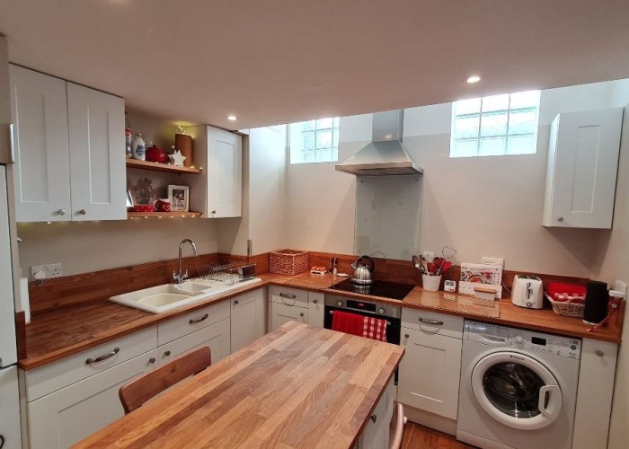 5. Kitchen (Cream or White units)