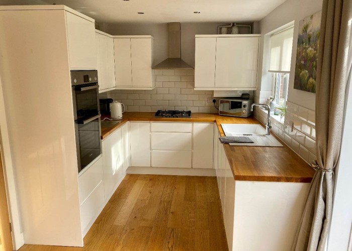 5. Kitchen (Cream or White units)