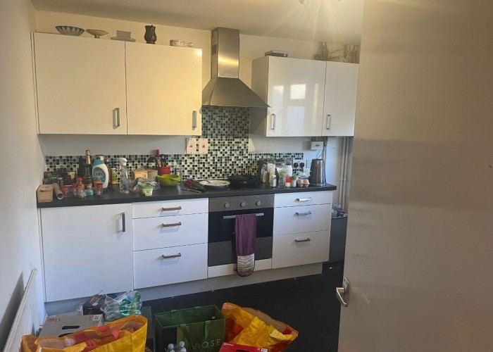 5. Kitchen (Cream or White units)