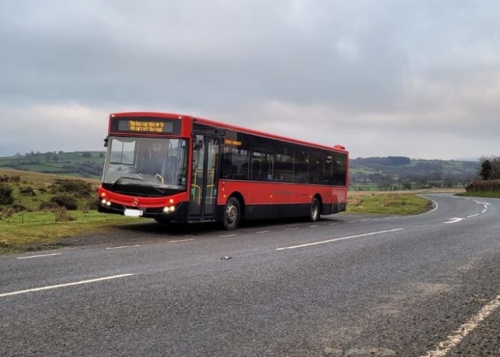 Modern Red Single Decker Bus For Hire