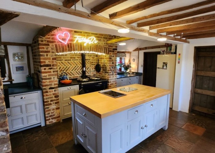 4. Kitchen (With Island), Kitchen (Cream or White units), Kitchen With Table, Kitchen (Gas Hob)