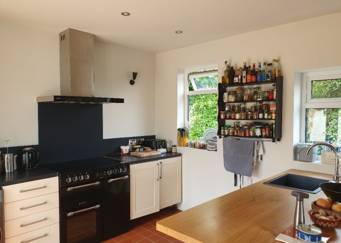 4. Kitchen (With Island), Kitchen (Cream or White units), Kitchen (Modern), Kitchen (Electric/Induction Hob)