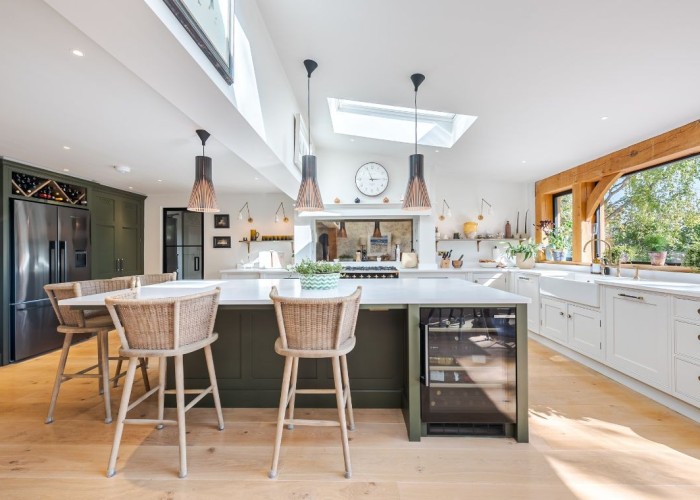 5. Kitchen (With Island), Kitchen (Cream or White units), Kitchen (Modern), Kitchen With Table, Kitchen (Electric/Induction Hob)