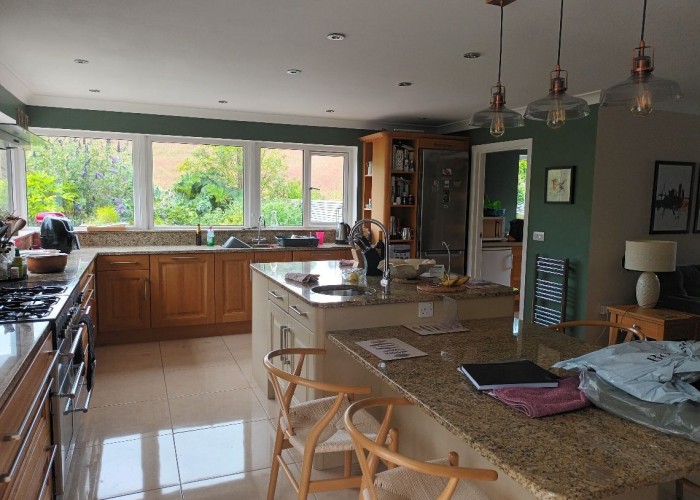 6. Kitchen (With Island), Kitchen (Cream or White units), Kitchen (Wooden Units), Kitchen With Table, Kitchen (Gas Hob)