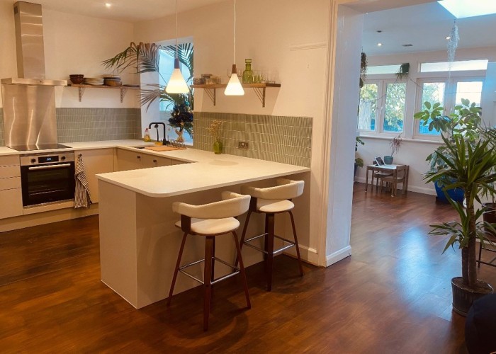 4. Kitchen (With Island), Kitchen (Cream or White units), Kitchen (Modern), Kitchen (Electric/Induction Hob)