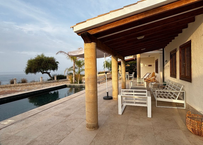 Villa Sitting On A Cliff Overlooking The Sea For Filming