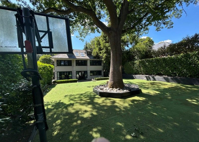31. Back Garden with Large Patio and Basketball Net