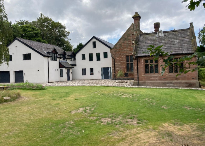 Stone Home With White Modern Extension For Filming