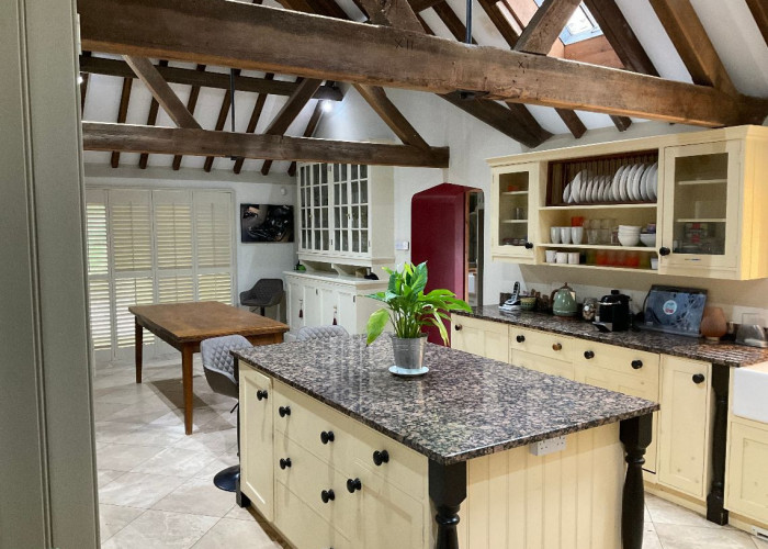 10. Kitchen (With Island), Kitchen (Cream or White units), Kitchen (Rustic), Kitchen With Table, Kitchen (White units)