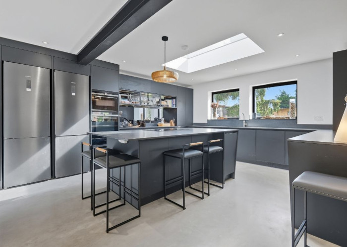 4. Kitchen (With Island), Kitchen (Coloured units), Kitchen (Modern), Skylight, Kitchen (Electric/Induction Hob)
