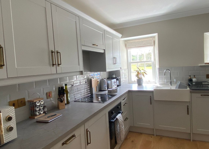 7. Kitchen (Cream or White units), Kitchen (Modern), Kitchen (Electric/Induction Hob)