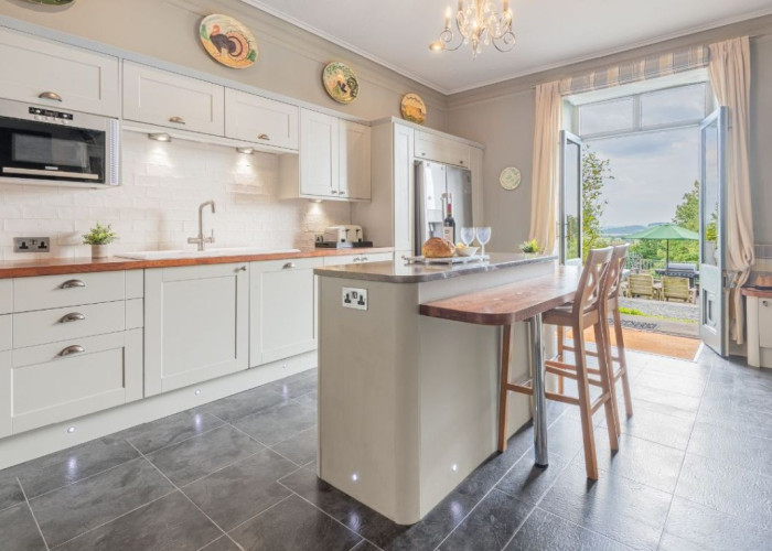 8. Kitchen (With Island), Kitchen (Cream or White units), Kitchen (Modern), Kitchen With Table, Kitchen (Electric/Induction Hob)