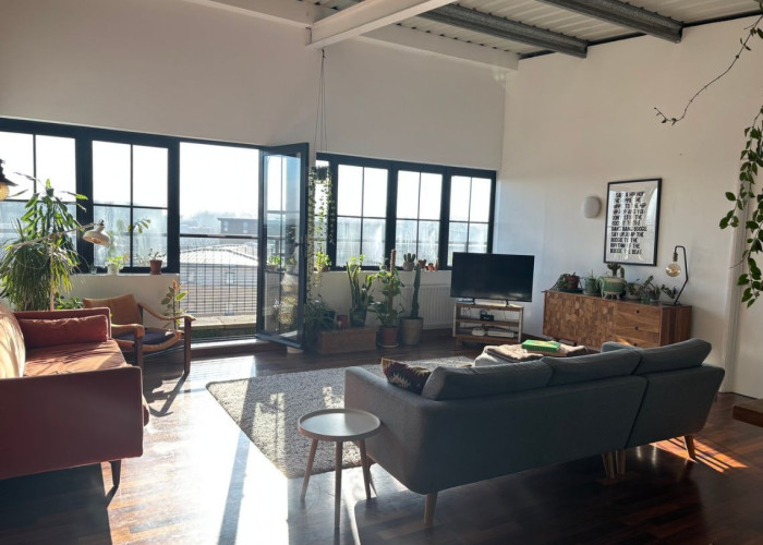 Open Plan Warehouse Apartment With Turquoise Kitchen Available for Filming
