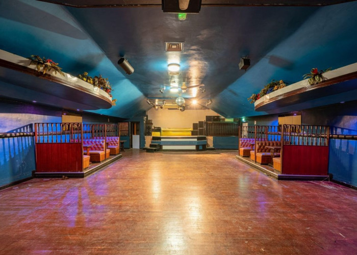 A Club in the Attic Space with Bar for Filming