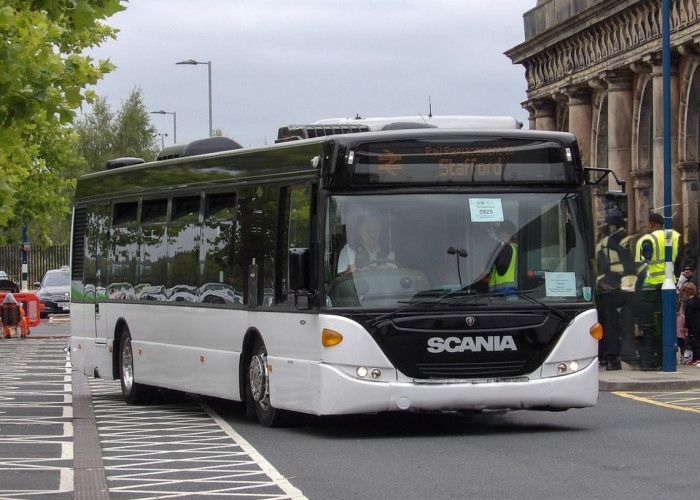 5. Modern white bus for filming (Birmingham)