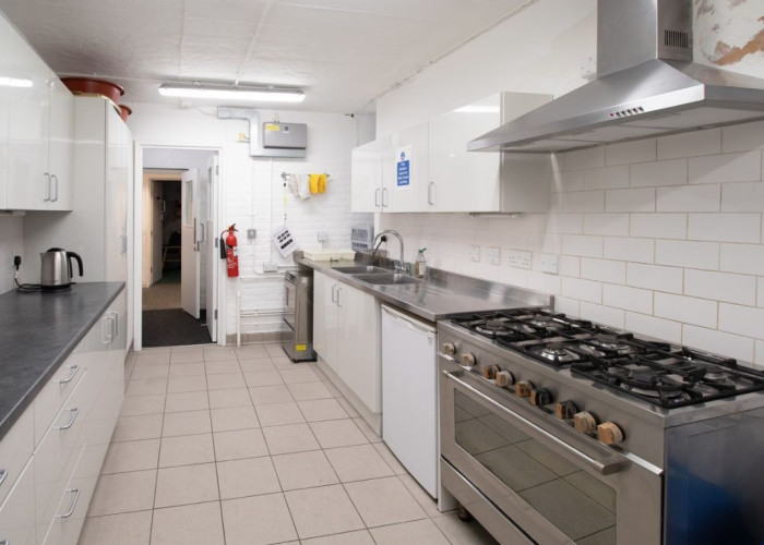 26. Kitchen, Church, Kitchen (Cream or White units), Community Center, Kitchen (Gas Hob)