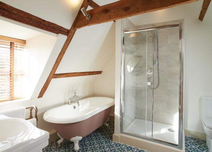 Bathroom (Roll Top), Bathroom (Shower and bath) at Spacious Three Storey House For Filming, Norfolk