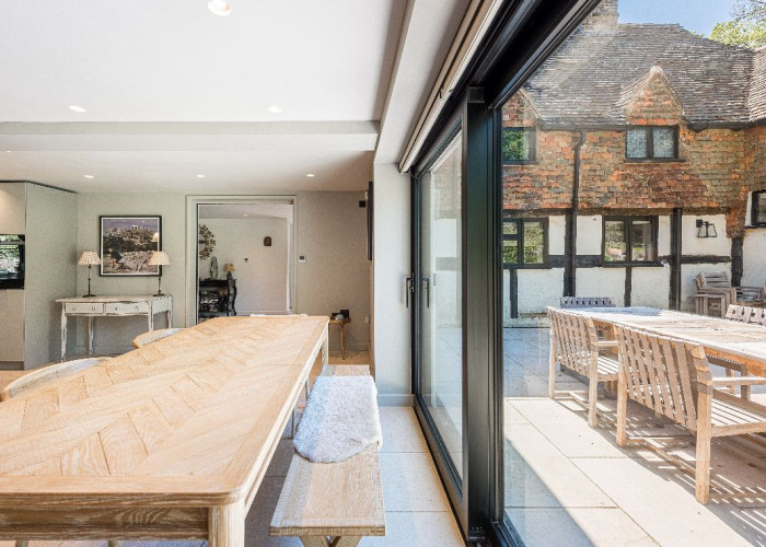 Bi-Fold Doors at Contemporary 16th Century Black And White House For Filming, West Sussex